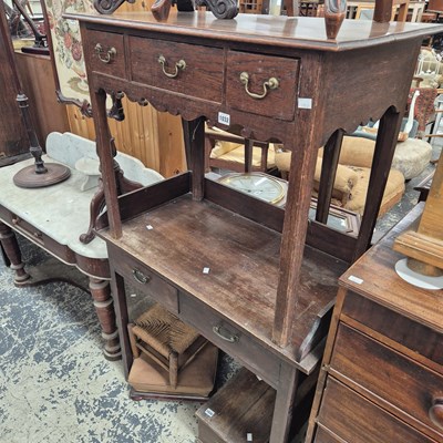 Lot 1032 - A Georgian oak lowboy and a gallery back small...