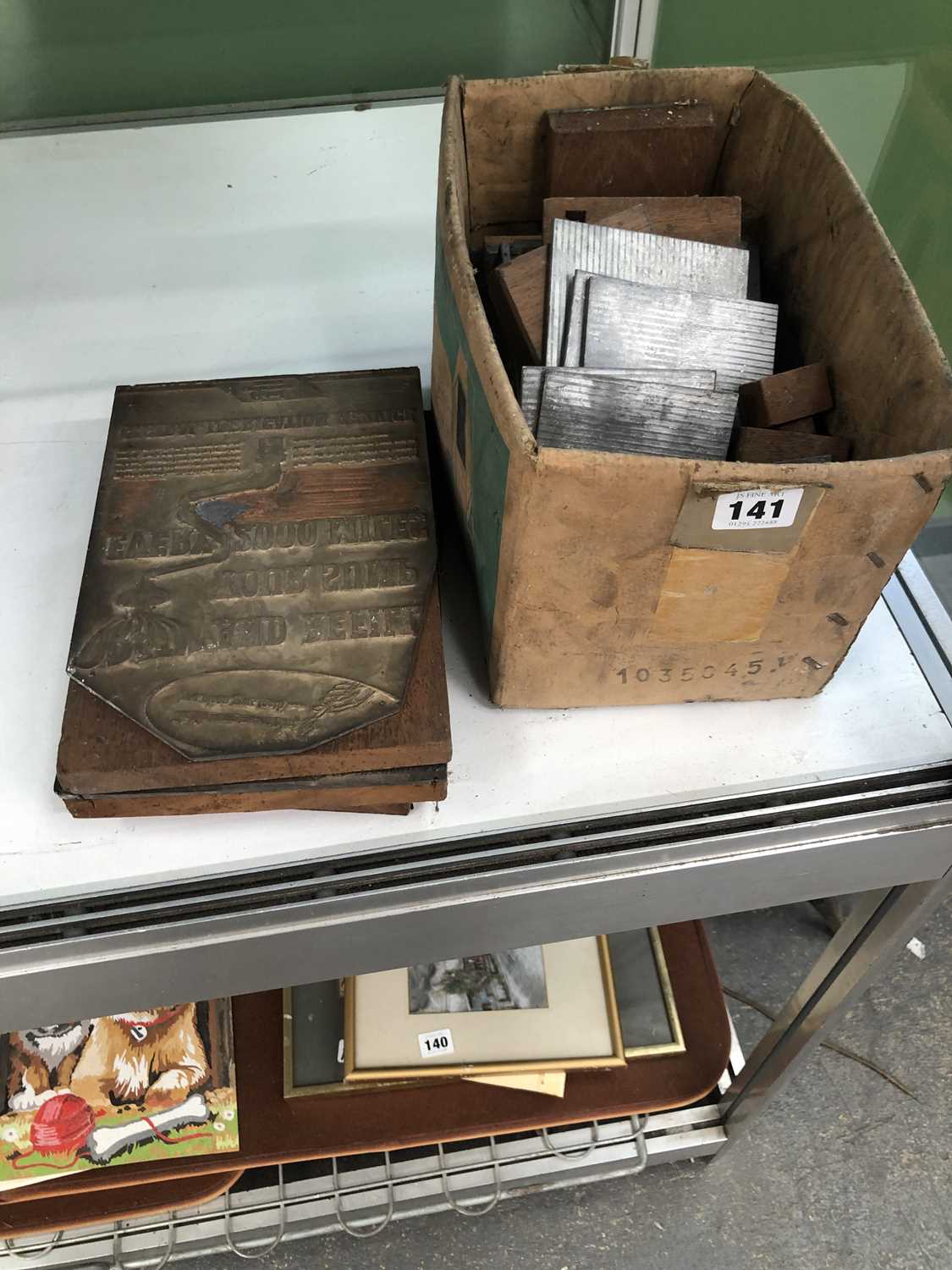 Lot 141 - A quantity of vintage printing blocks.