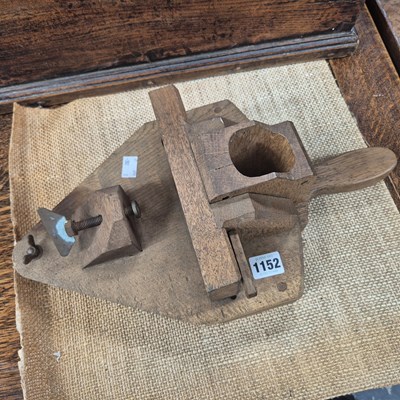 Lot 1152 - An oak bench clamp pole end trimmer, the swing...