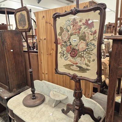 Lot 1035 - Two 19th century pole screens.