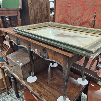 Lot 1054 - A Continental-style low table on six legs and...