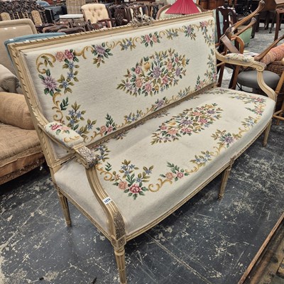 Lot 1074 - An antique French salon settee.