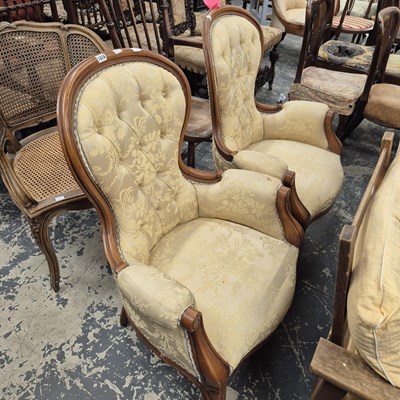 Lot 1076 - A Pair of Victorian-style button-back chairs.