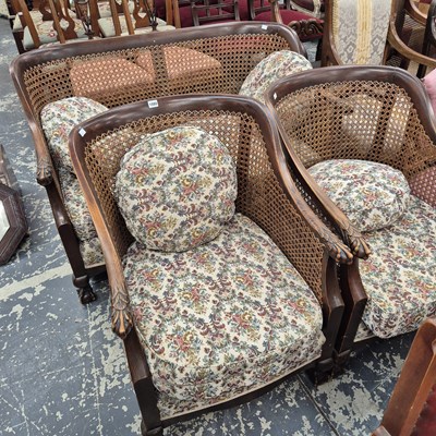 Lot 1080 - A caned back three piece suite.