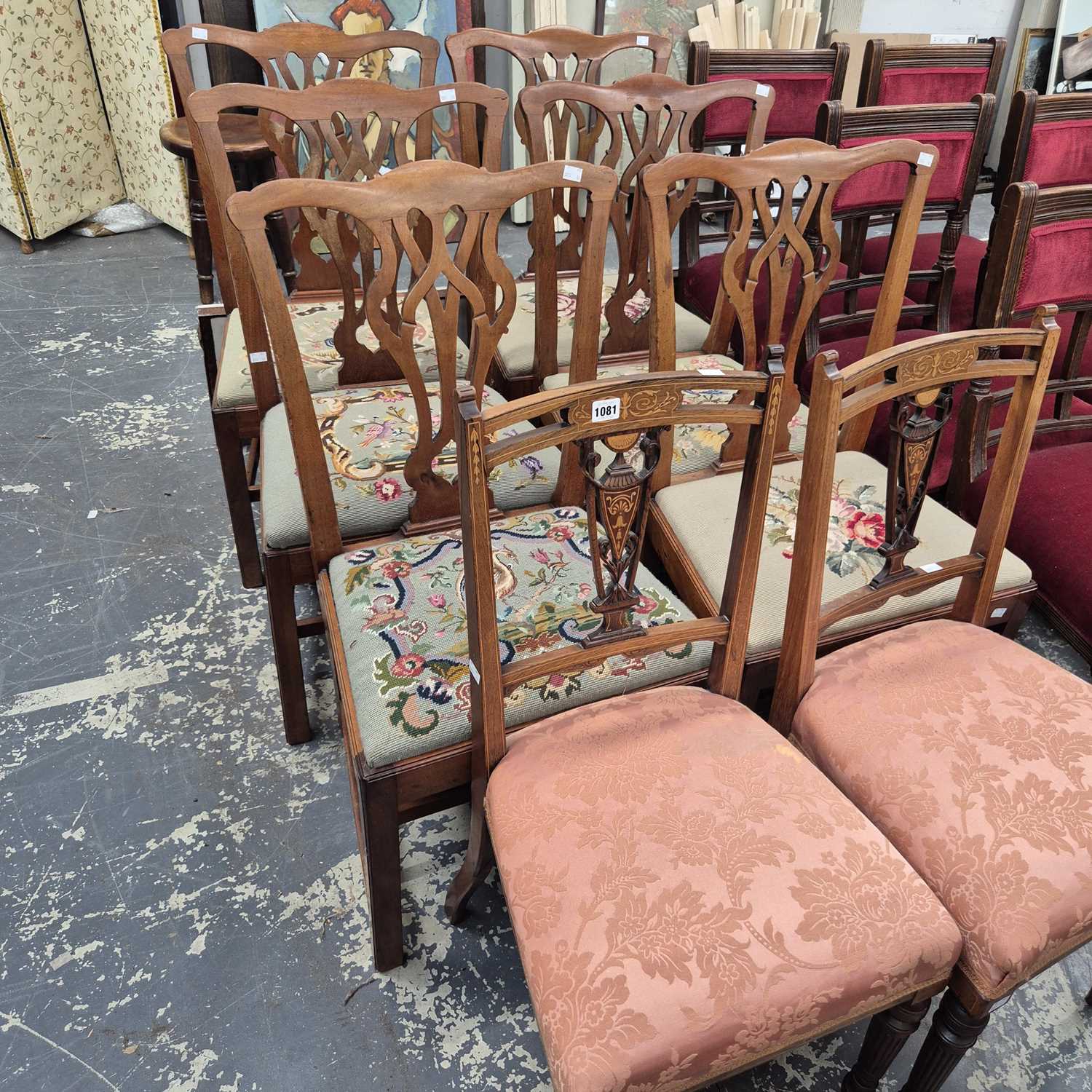 Lot 1081 - A set of six Georgian style dining chairs and...