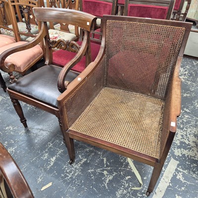 Lot 1083 - A Bergere library armchair and a late Georgian...