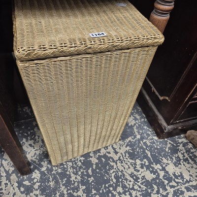 Lot 1164 - A Lloyd Loom linen basket
