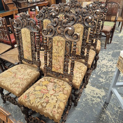 Lot 1085 - A good set of eight antique carved oak...