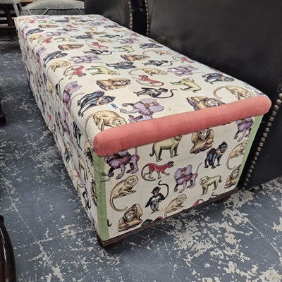 Lot 1094 - A box ottoman with primate decorated coverings....