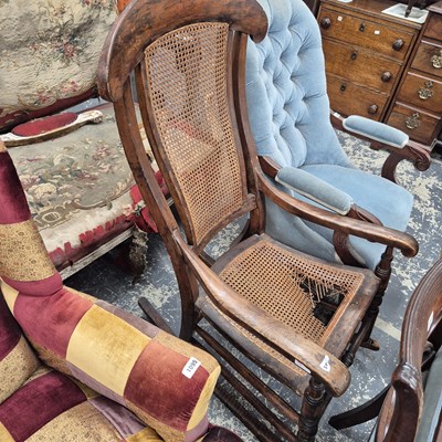 Lot 1096 - an antique rocking chair.