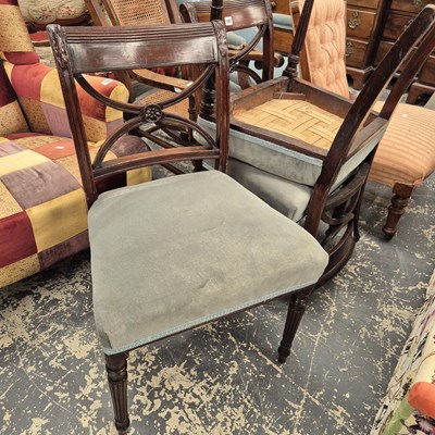 Lot 1097 - A set of four late Georgian dining chairs.
