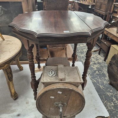 Lot 1169 - A late Victorian mahogany table with a shaped...