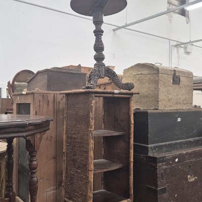 Lot 1172 - An Indian carved hardwood tripod table...
