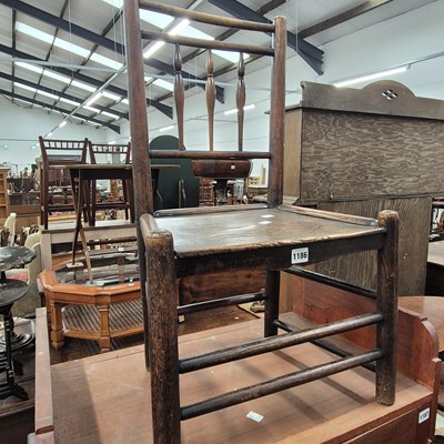 Lot 1186 - A late 18th/early 19th century oak spindle...