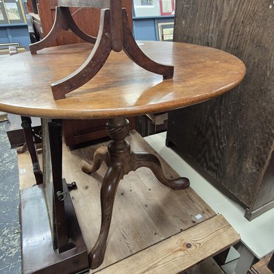Lot 1190 - A 19th century mahogany tripod table,the...