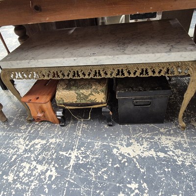 Lot 1192 - A mottled white marble topped coffee table on...