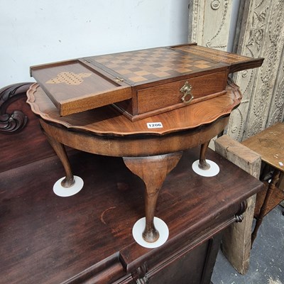Lot 1206 - A mahogany games box inlaid inside the flap...