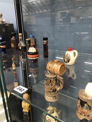Lot 342 - Spirits and Miniatures three ceramic figurine...