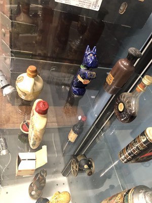 Lot 342 - Spirits and Miniatures three ceramic figurine...