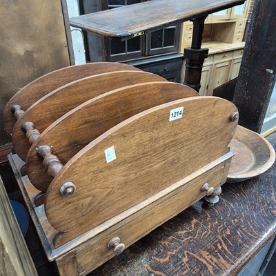 Lot 1214 - A 19th century 0ak canterbury with four round...