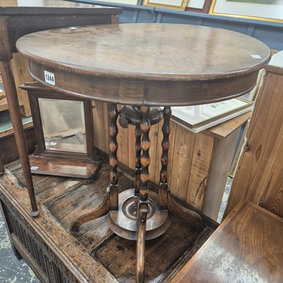 Lot 1244 - An oak occasional table.