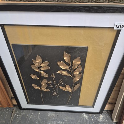 Lot 1316 - A gilded leaf artwork.