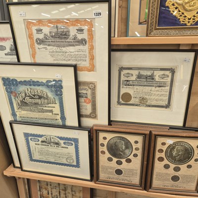 Lot 1329 - A group of various framed stock certificates...