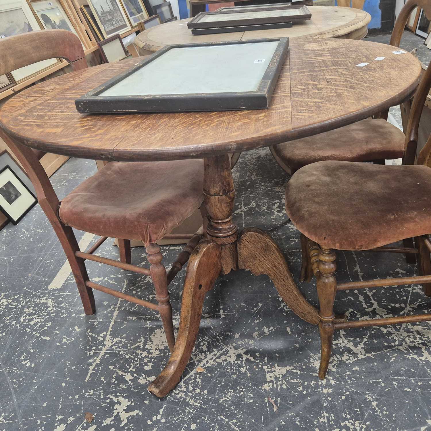 Lot 1338 - A large oak tripod table.