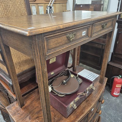 Lot 1349 - An oak side table with two drawers