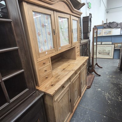 Lot 1369 - A large continental pine dresser