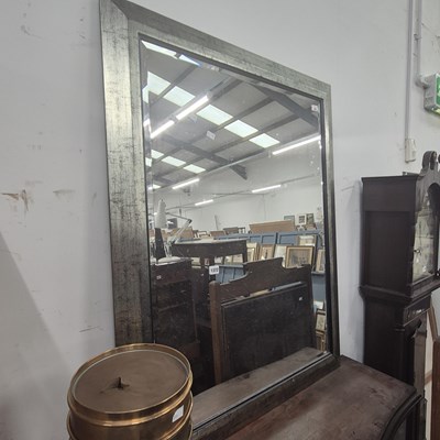 Lot 1372 - A modern wall mirror
