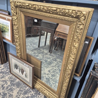 Lot 1392 - A Large gilt framed mirror.