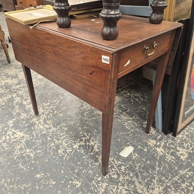 Lot 1402 - A mahogany pembroke table.