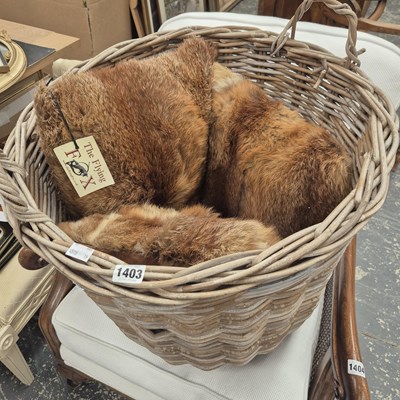 Lot 1403 - Various Fox fur cushions and a wicker basket