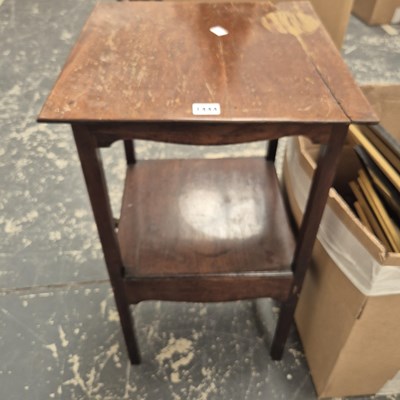 Lot 1444 - A two tier occasional table.