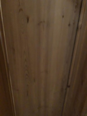 Lot 1451 - A large pine wardrobe. W 178 D 59 H 185 cm