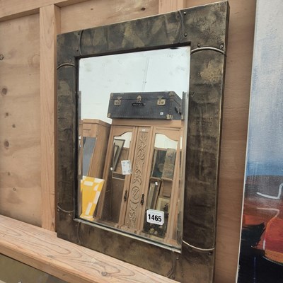Lot 1465 - A small arts and crafts mirror.