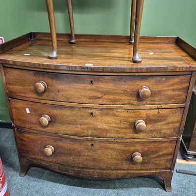 Lot 801 - A 19th century mahogany bowfront chest of...