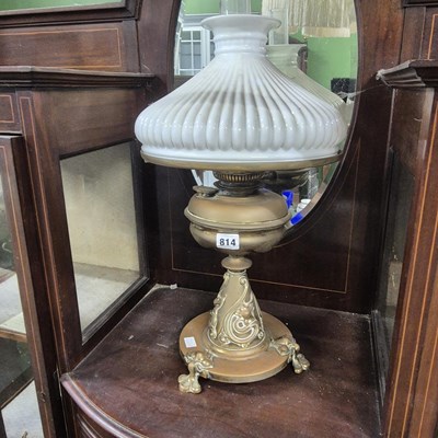 Lot 814 - An art nouveau oil lamp.