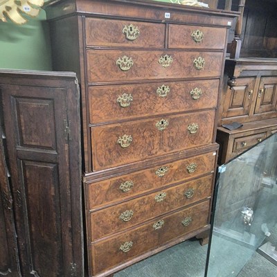 Lot 826 - An 18th century Walnut chest on chest.