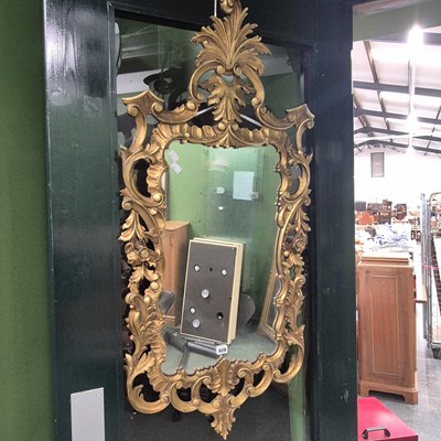 Lot 828 - A Georgian style gilt frame mirror.