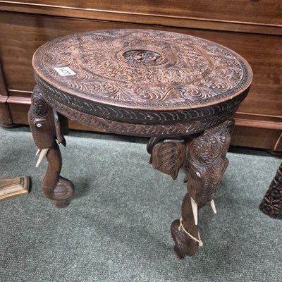Lot 1477 - An eastern hardwood stool.