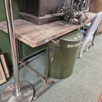 Lot 1481 - A pair of iron trestles with heavy single...