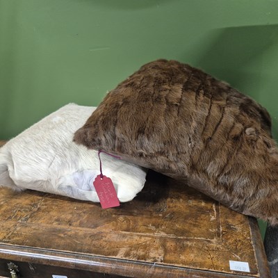 Lot 1492 - A mink fur cushion and one other.