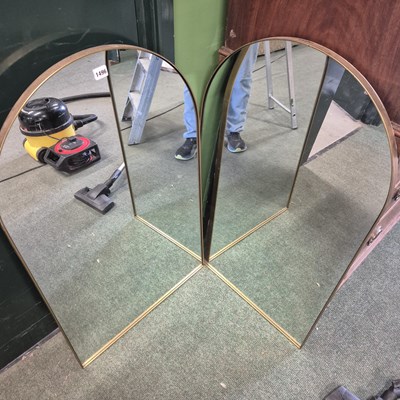 Lot 1496 - A pair of gilt metal framed arch top wall...