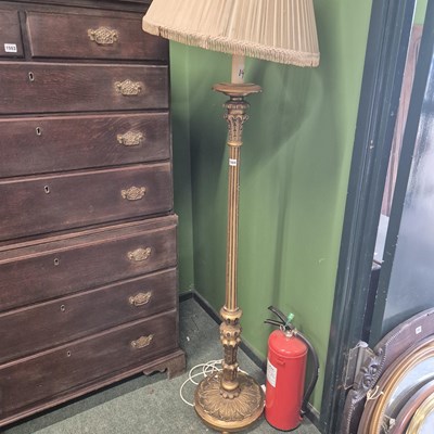 Lot 1504 - A gilt standard lamp