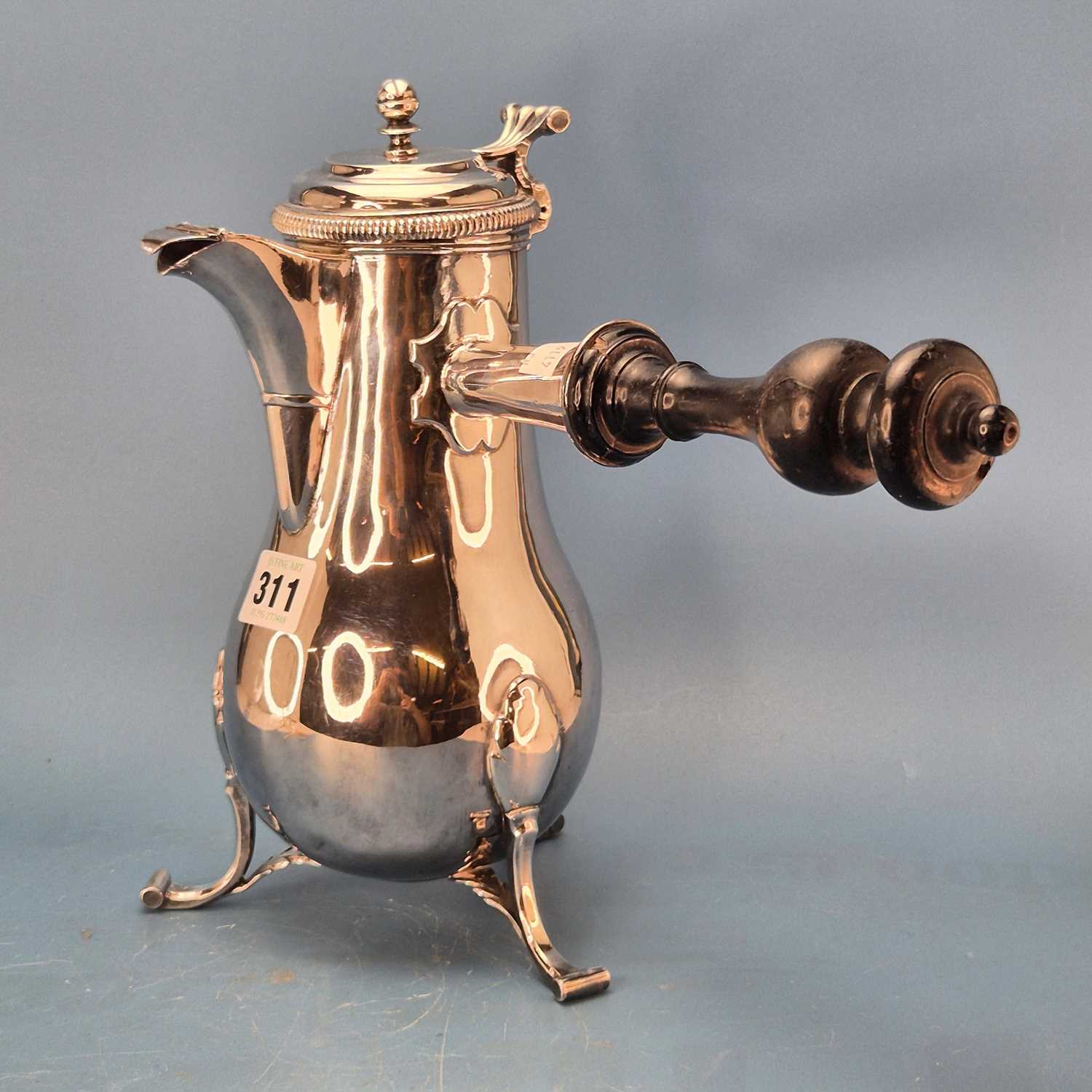 Lot 311 - An 18th century French silver chocolate pot on...