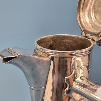 Lot 311 - An 18th century French silver chocolate pot on...