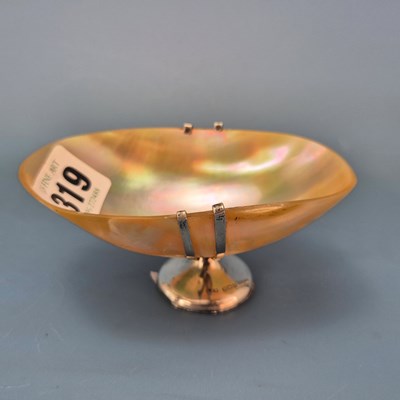 Lot 319 - A silver mounted mother of pearl bowl by...