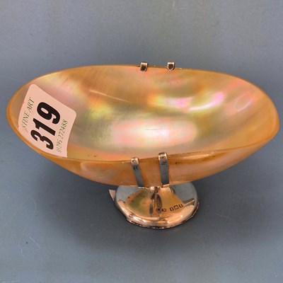Lot 319 - A silver mounted mother of pearl bowl by...